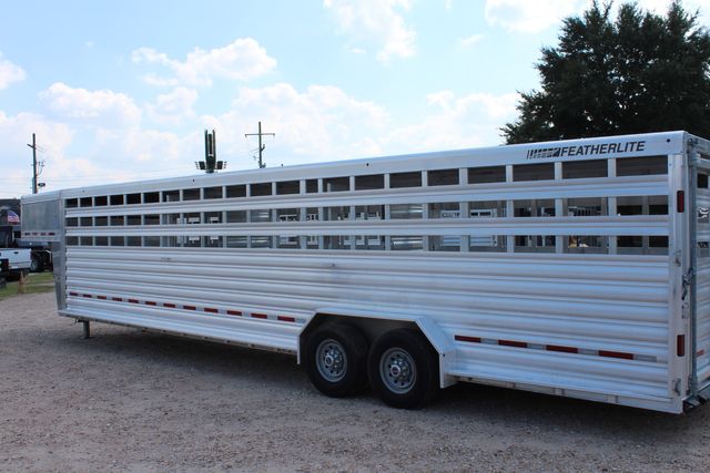 2022 Featherlite 8127 - 32' GN Livestock, 2 Cut Gates w/ sliders, Tandem 8Ks | CONROE, TX | SportChassis/ Featherlite Trailers of Texas 2022 Featherlite 8127 - 32' GN Livestock, 2 Cut Gates w/ sliders, Tandem 8Ks | CONROE, TX | SportChassis/ Featherlite Trailers of Texas