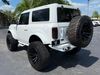 2022 Ford Bronco V6 BAYSHORE WHITEOUT 5" LIFT LEATHER 37" NITTOs | Plant City Florida | Bayshore Automotive 2022 Ford Bronco V6 BAYSHORE WHITEOUT 5" LIFT LEATHER 37" NITTOs | Plant City Florida | Bayshore Automotive