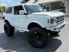 2022 Ford Bronco V6 BAYSHORE WHITEOUT 5" LIFT LEATHER 37" NITTOs | Plant City Florida | Bayshore Automotive 2022 Ford Bronco V6 BAYSHORE WHITEOUT 5" LIFT LEATHER 37" NITTOs | Plant City Florida | Bayshore Automotive