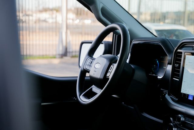 2022 Ford F-150 Lightning Pro EV / CLEAN CARFAX / 1-OWNER / BIG SCREEN | Austin, TX | Rocky Mountain Truck Stop Austin