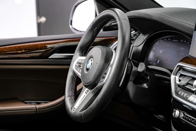 2023 BMW X4 M40i OneOwner PerfectCarfax PremiumPkg ParkAsst | Dallas, TX | Stevens Motor Company LLC 2023 BMW X4 M40i OneOwner PerfectCarfax PremiumPkg ParkAsst | Dallas, TX | Stevens Motor Company LLC