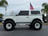 2023 Ford Bronco BAYSHORE RETRO CACTUS WHITE LEATHER LIFTED LOADED | Plant City Florida | Bayshore Automotive 2023 Ford Bronco BAYSHORE RETRO CACTUS WHITE LEATHER LIFTED LOADED | Plant City Florida | Bayshore Automotive
