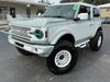 2023 Ford Bronco BAYSHORE RETRO CACTUS WHITE LEATHER LIFTED LOADED | Plant City Florida | Bayshore Automotive 2023 Ford Bronco BAYSHORE RETRO CACTUS WHITE LEATHER LIFTED LOADED | Plant City Florida | Bayshore Automotive