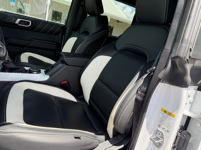 2024 Ford Bronco HARDTOP BIG BEND 12" NAV WHITE PEARL PURPLE SHIFT | Plant City, FL | psv5 DEMO - Bayshore Automotive 2024 Ford Bronco HARDTOP BIG BEND 12" NAV WHITE PEARL PURPLE SHIFT | Plant City, FL | psv5 DEMO - Bayshore Automotive