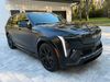 2025 Cadillac Escalade IQ SATIN BLACK ESCALADE IQ SPORT 2 REAR ENT 24"s | Plant City Florida | Bayshore Automotive 