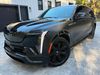 2025 Cadillac Escalade IQ SATIN BLACK ESCALADE IQ SPORT 2 REAR ENT 24"s | Plant City Florida | Bayshore Automotive 