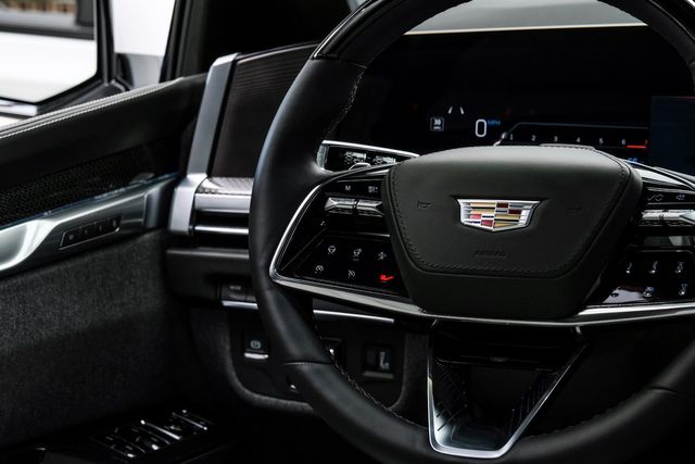 2025 Cadillac Escalade-V 4WD HUD, ROOF, REAR DVD, VOSSEN 24'S, MATTE PPF | Carrollton, TX | Texas Vehicle Exchange