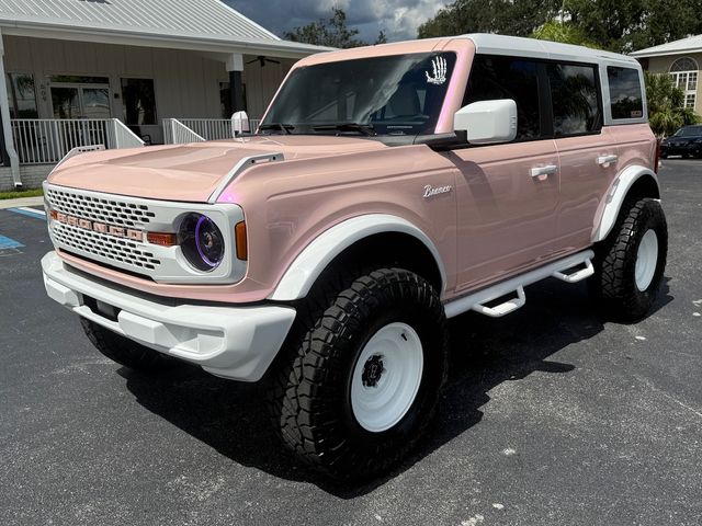 2025 Ford Bronco BAYSHORE BRONCO "PEACHY KEEN" LEATHE HARDTOP | Plant City, FL | psv5 DEMO - Bayshore Automotive 2025 Ford Bronco BAYSHORE BRONCO "PEACHY KEEN" LEATHE HARDTOP | Plant City, FL | psv5 DEMO - Bayshore Automotive