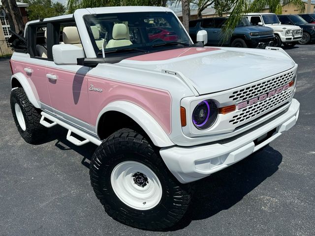 2025 Ford Bronco BAYSHORE BRONCO BLUSH PINK RETRO LEATHER | Plant City, FL | psv5 DEMO - Bayshore Automotive 2025 Ford Bronco BAYSHORE BRONCO BLUSH PINK RETRO LEATHER | Plant City, FL | psv5 DEMO - Bayshore Automotive