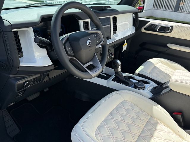 2025 Ford Bronco BAYSHORE BRONCO BLUSH PINK RETRO LEATHER | Plant City, FL | psv5 DEMO - Bayshore Automotive