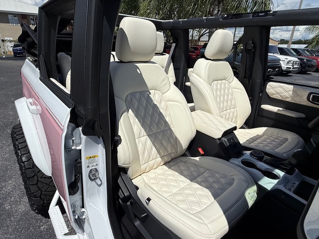 2025 Ford Bronco BAYSHORE BRONCO BLUSH PINK RETRO LEATHER | Plant City, FL | psv5 DEMO - Bayshore Automotive 2025 Ford Bronco BAYSHORE BRONCO BLUSH PINK RETRO LEATHER | Plant City, FL | psv5 DEMO - Bayshore Automotive
