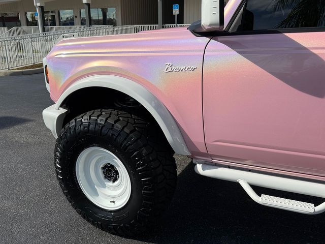 2025 Ford Bronco BAYSHORE BRONCO BABY PINK PEARL LEATHER LIFTED | Plant City, FL | psv5 DEMO - Bayshore Automotive 2025 Ford Bronco BAYSHORE BRONCO BABY PINK PEARL LEATHER LIFTED | Plant City, FL | psv5 DEMO - Bayshore Automotive