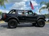 2025 Ford Bronco BAYSHORE CUSTOM BRONCO BLACKOUT SADDLE LEATHER | Plant City Florida | Bayshore Automotive 