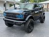 2025 Ford Bronco BAYSHORE CUSTOM BRONCO BLACKOUT SADDLE LEATHER | Plant City Florida | Bayshore Automotive 