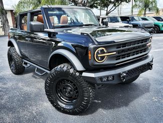 2025 Ford Bronco BAYSHORE CUSTOM BRONCO BLACKOUT SADDLE LEATHER | Plant City Florida | Bayshore Automotive 