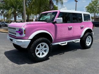 2025 Ford Bronco GLITTER GLAM PINK BRONCO WHITE ITALIAN LEATHER | Plant City Florida | Bayshore Automotive 