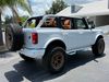 2025 Ford Bronco BAYSHORE WHITE BRONZE LEATHER LIFTED LOADED HRDTP | Plant City Florida | Bayshore Automotive 