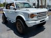 2025 Ford Bronco BAYSHORE WHITE BRONZE LEATHER LIFTED LOADED HRDTP | Plant City Florida | Bayshore Automotive 2025 Ford Bronco BAYSHORE WHITE BRONZE LEATHER LIFTED LOADED HRDTP | Plant City Florida | Bayshore Automotive