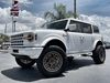 2025 Ford Bronco BAYSHORE WHITE BRONZE LEATHER LIFTED LOADED HRDTP | Plant City Florida | Bayshore Automotive 2025 Ford Bronco BAYSHORE WHITE BRONZE LEATHER LIFTED LOADED HRDTP | Plant City Florida | Bayshore Automotive