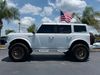 2025 Ford Bronco BAYSHORE WHITE BRONZE LEATHER LIFTED LOADED HRDTP | Plant City Florida | Bayshore Automotive 