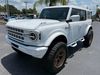 2025 Ford Bronco BAYSHORE WHITE BRONZE LEATHER LIFTED LOADED HRDTP | Plant City Florida | Bayshore Automotive 