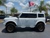 2025 Ford Bronco BAYSHORE WHITE BRONZE LEATHER LIFTED LOADED HRDTP | Plant City Florida | Bayshore Automotive 