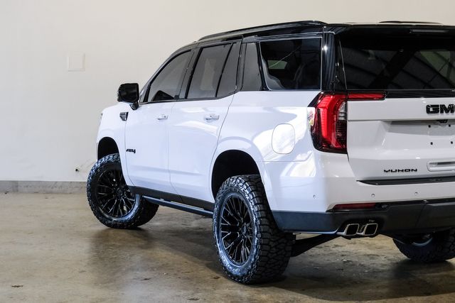 2025 GMC Yukon AT4 4X4,LIFTED,ROOF,360 CAM,HTD/COOL LTH,20'S,8K | Carrollton, TX | Texas Vehicle Exchange