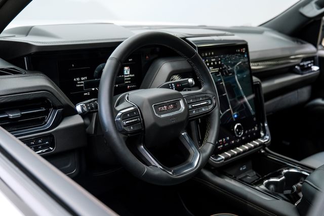 2025 GMC Yukon AT4 4X4,LIFTED,ROOF,360 CAM,HTD/COOL LTH,20'S,8K | Carrollton, TX | Texas Vehicle Exchange