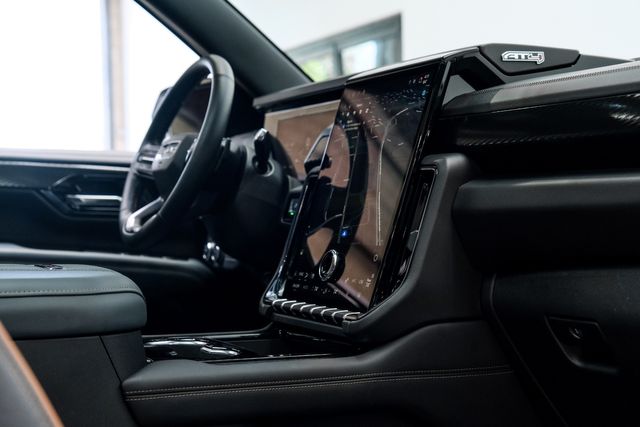 2025 GMC Yukon AT4 4X4,LIFTED,ROOF,360 CAM,HTD/COOL LTH,20'S,8K | Carrollton, TX | Texas Vehicle Exchange