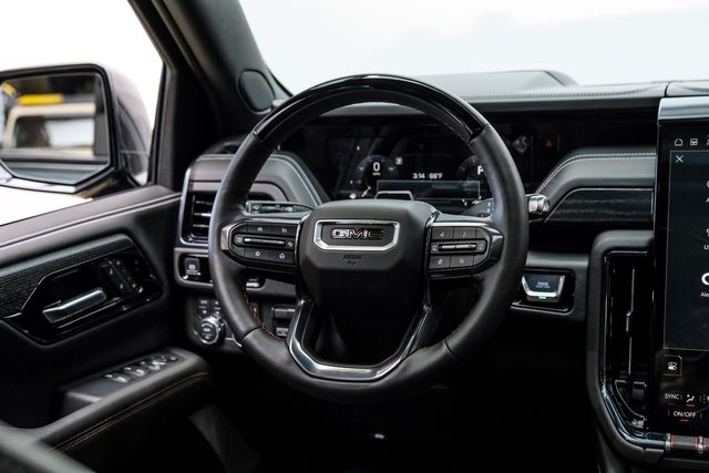 2025 GMC Yukon XL AT4 Ultimate ,4WD,LIFTED,22" VOSSENS,DVD,DIESEL | Carrollton, TX | Texas Vehicle Exchange