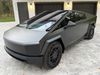 2025 Tesla Cybertruck 2025 TESLA SATIN BLACK CYBERTRUCK CARFAX 1 OWNER | Plant City Florida | Bayshore Automotive 